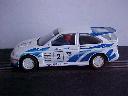 White and blue Ford Escort
