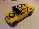 Yellow Land Rover on Scalextric chassis
