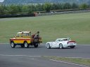 Yellow Landrover towing